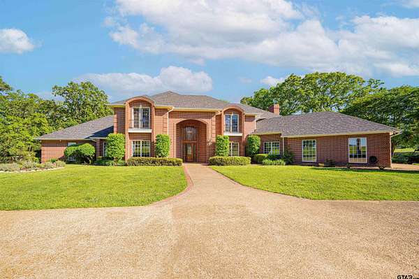 74.4 Acres of Agricultural Land with Home for Sale in Omaha, Texas