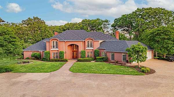 74.4 Acres of Agricultural Land with Home for Sale in Omaha, Texas