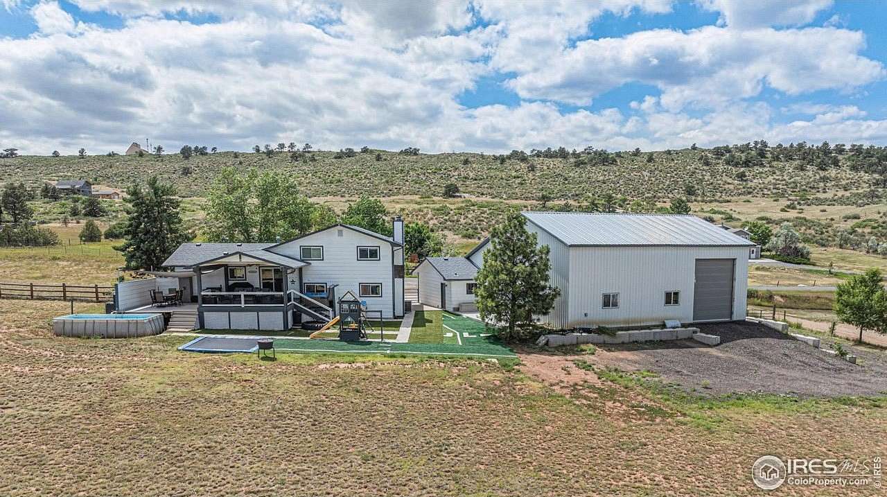 2.14 Acres of Residential Land with Home for Sale in Loveland, Colorado