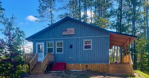 80 Acres of Recreational Land with Home for Sale in Pickford, Michigan