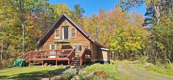 5.1 Acres of Residential Land with Home for Sale in Delta, Wisconsin