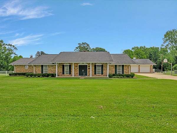 13.9 Acres of Land with Home for Sale in Nacogdoches, Texas