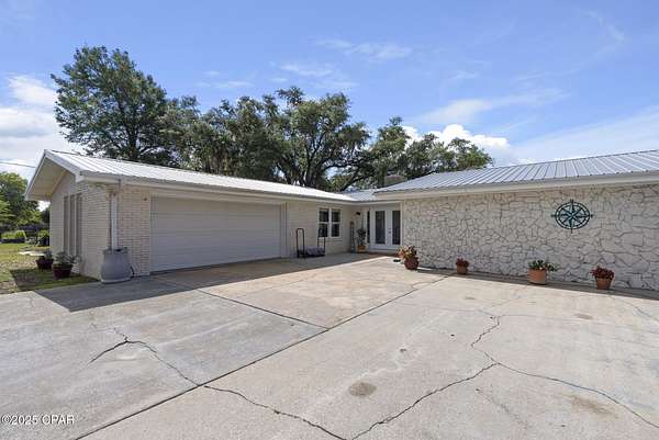 5.17 Acres of Residential Land with Home for Sale in Panama City, Florida