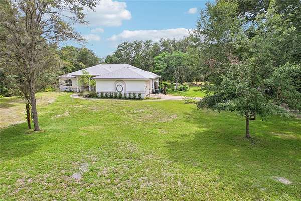 1.8 Acres of Residential Land with Home for Sale in Wesley Chapel, Florida