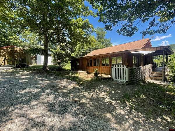 10.6 Acres of Land with Home for Sale in Yellville, Arkansas