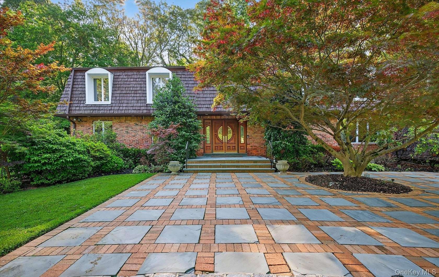 2.24 Acres of Residential Land with Home for Sale in Muttontown, New York