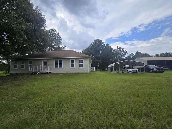 56.8 Acres of Agricultural Land with Home for Sale in Mauk, Georgia
