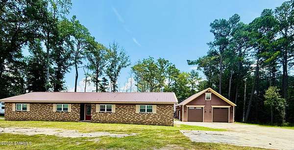 4.2 Acres of Residential Land with Home for Sale in Collinsville, Mississippi