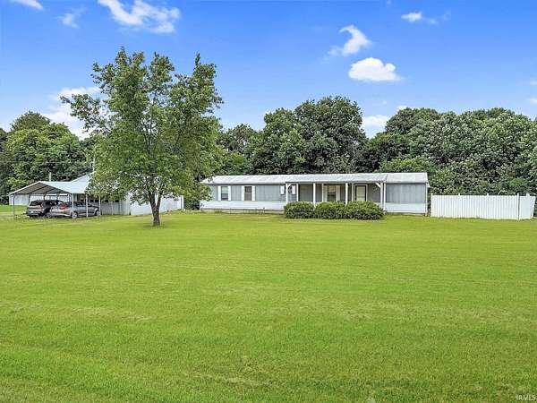 5.56 Acres of Residential Land with Home for Sale in Cannelton, Indiana