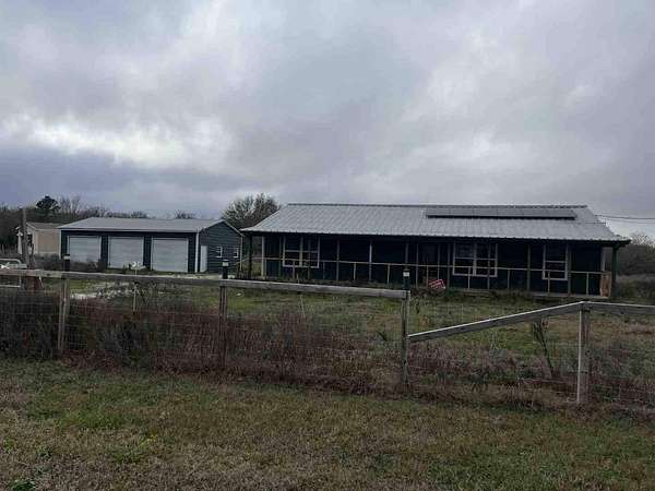 3 Acres of Land with Home for Auction in Bedias, Texas