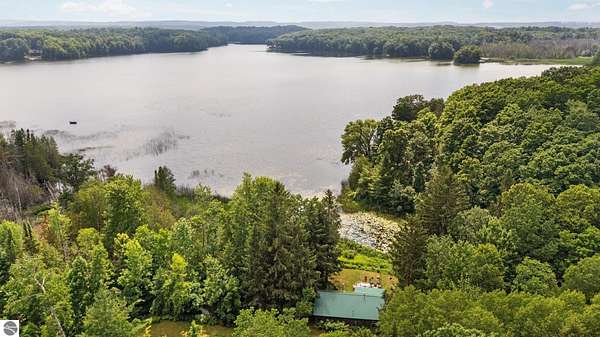 29 Acres of Recreational Land with Home for Sale in Bellaire, Michigan