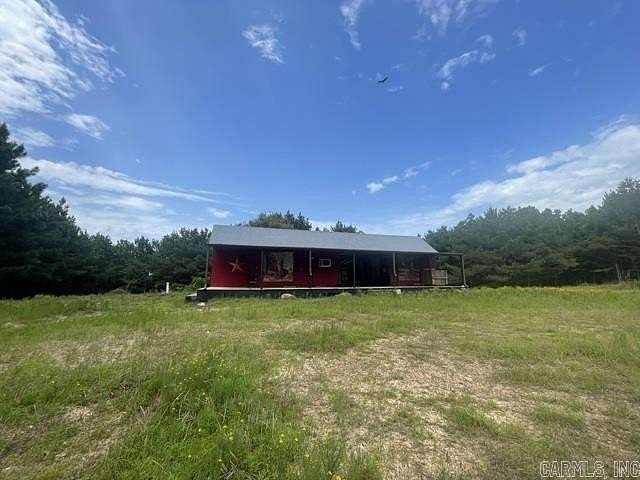 157 Acres of Recreational Land with Home for Sale in Cove, Arkansas