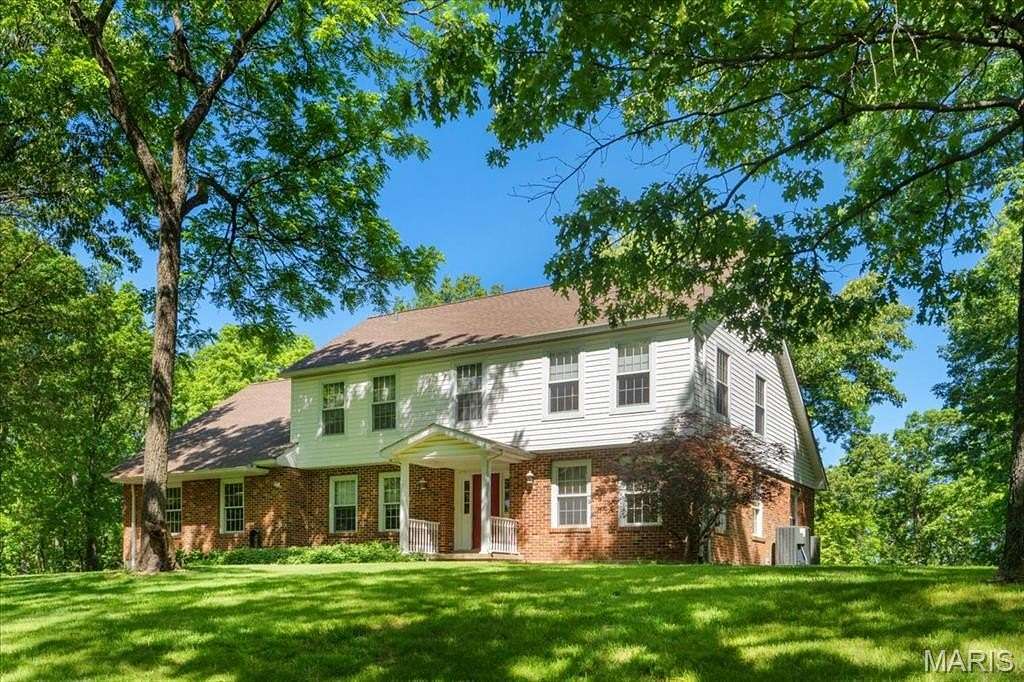 65.2 Acres of Land with Home for Sale in High Ridge, Missouri