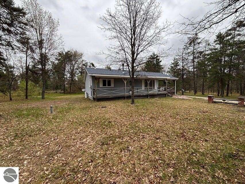 5 Acres of Residential Land with Home for Sale in Grayling, Michigan