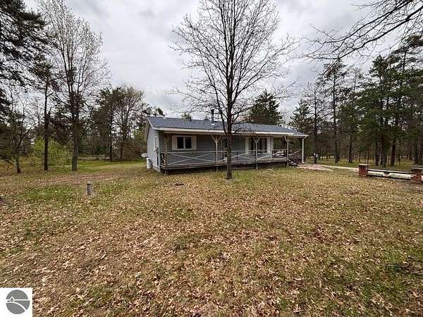 5 Acres of Residential Land with Home for Sale in Grayling, Michigan