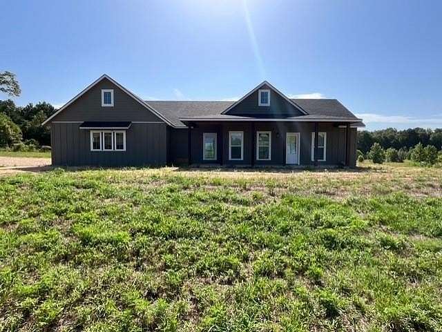 2 Acres of Residential Land with Home for Sale in Naples, Texas