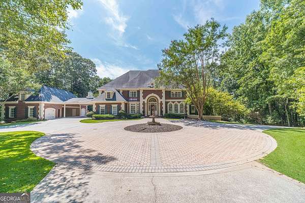 3.13 Acres of Residential Land with Home for Sale in Suwanee, Georgia