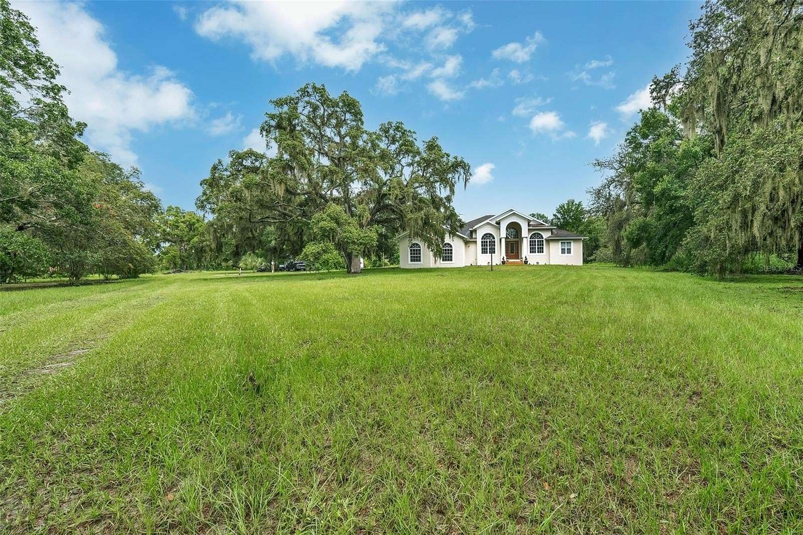 6.9 Acres of Residential Land with Home for Sale in Lithia, Florida