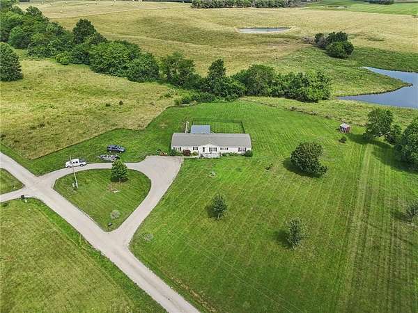5 Acres of Residential Land with Home for Sale in Centerview, Missouri