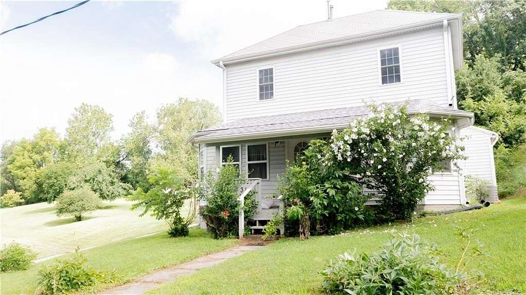 4.7 Acres of Residential Land with Home for Sale in St. Joseph, Missouri