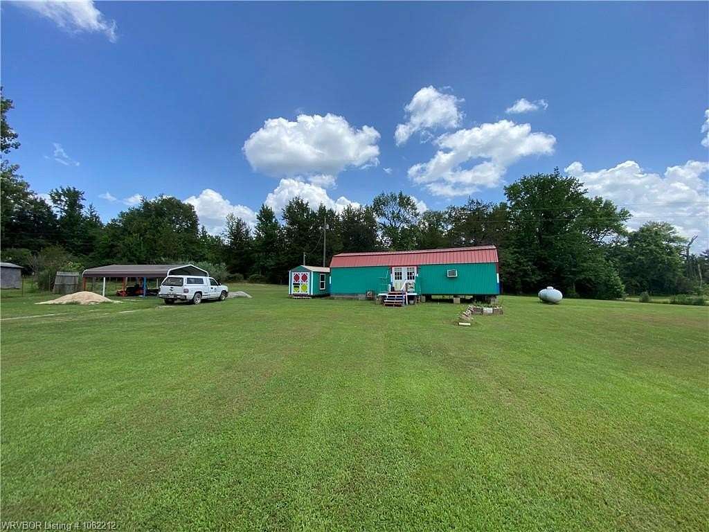 0.9 Acres of Land with Home for Sale in Mulberry, Arkansas