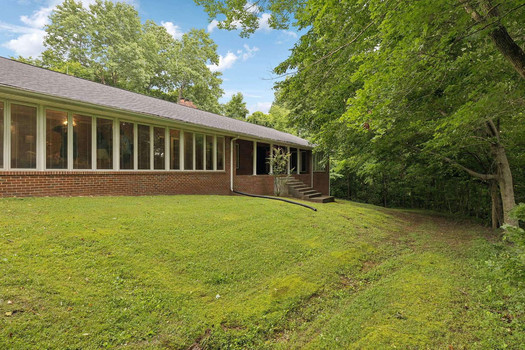 74.7 Acres of Recreational Land with Home for Sale in Charlotte, Tennessee