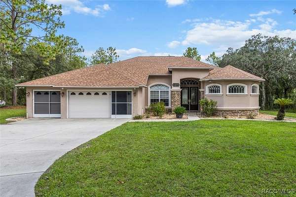 3.32 Acres of Residential Land with Home for Sale in Beverly Hills, Florida