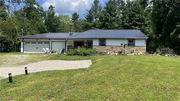 1.5 Acres of Residential Land with Home for Sale in Chagrin Falls, Ohio