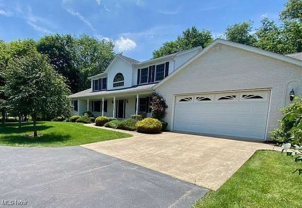 7.77 Acres of Residential Land with Home for Sale in New London, Ohio