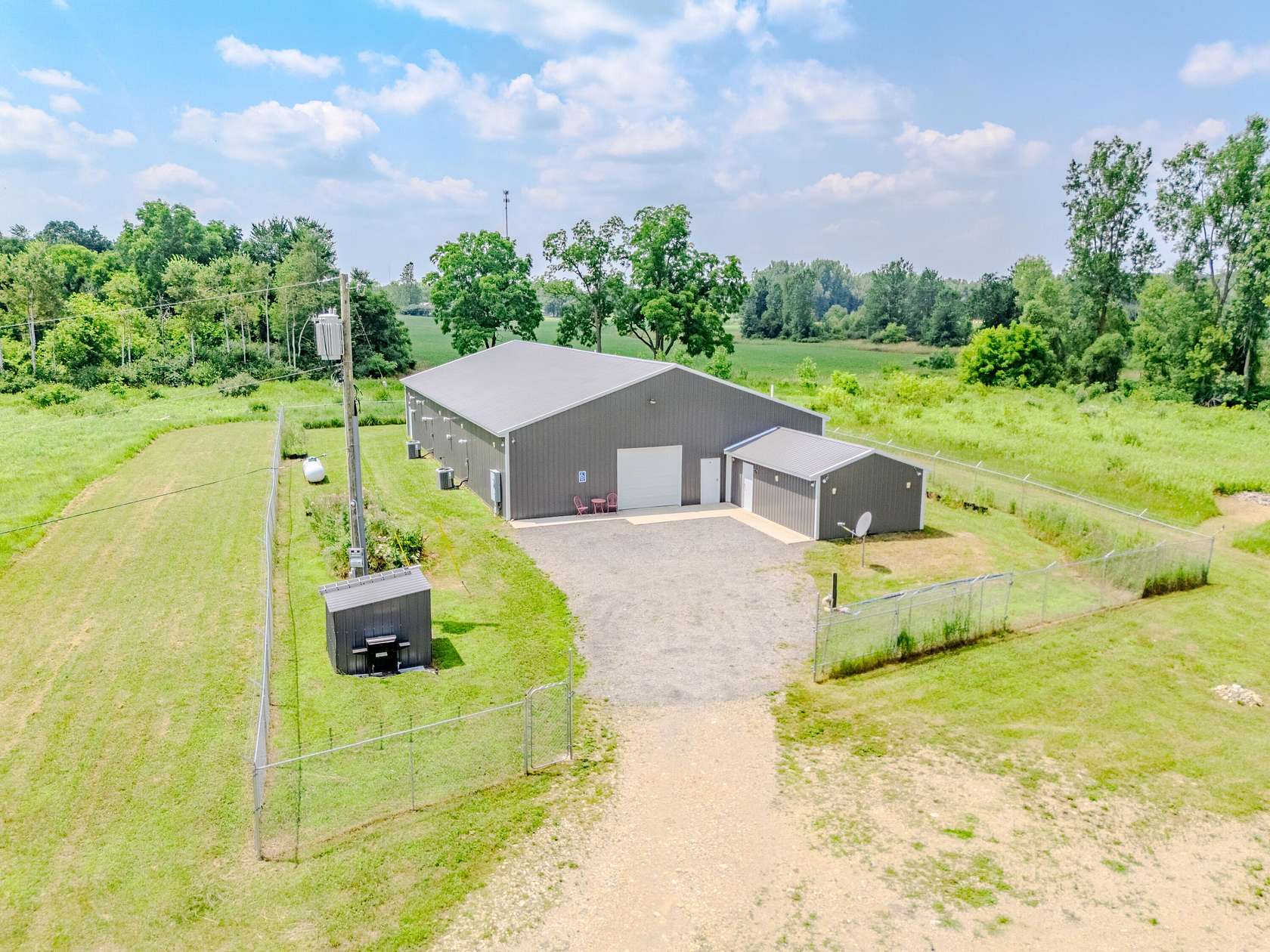 5 Acres of Improved Commercial Land for Sale in Pittsford, Michigan