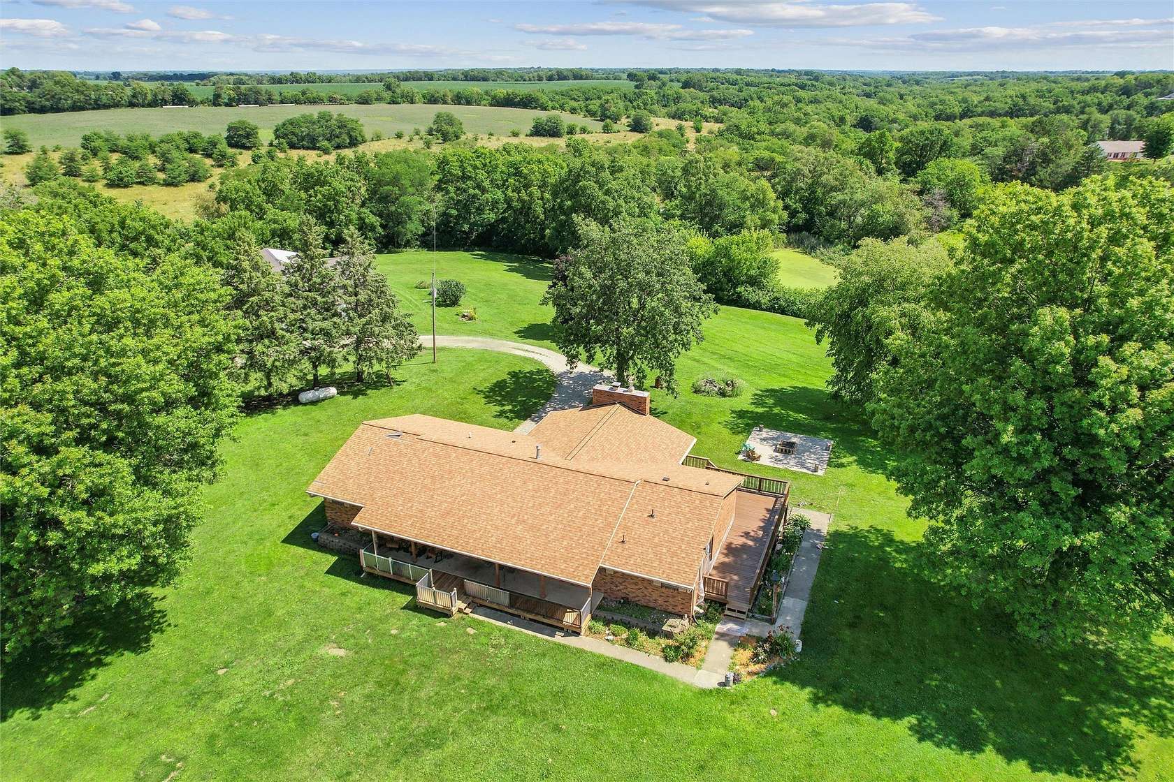 8.6 Acres of Residential Land with Home for Sale in Indianola, Iowa