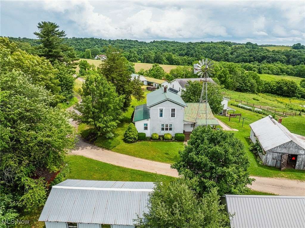 7.62 Acres of Land with Home for Auction in Fresno, Ohio