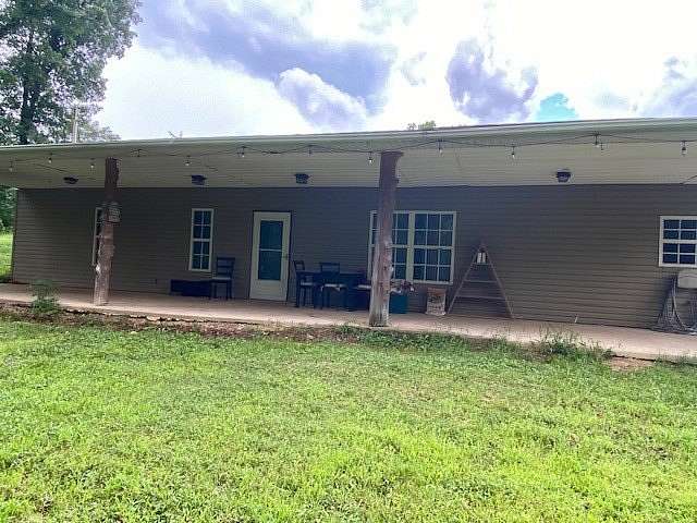 6.9 Acres of Residential Land with Home for Sale in Bloomfield, Missouri