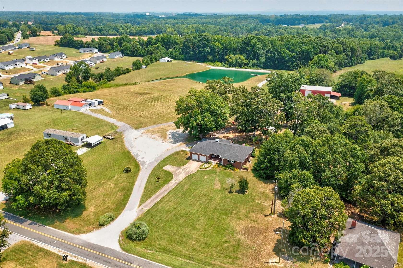 10.7 Acres of Land with Home for Sale in Shelby, North Carolina