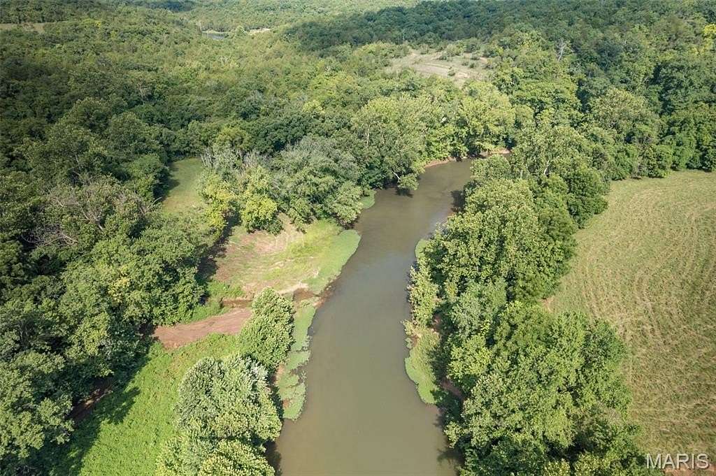 189 Acres of Recreational Land with Home for Sale in Fletcher, Missouri