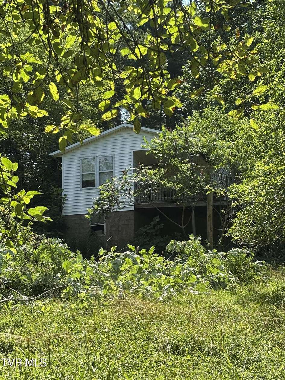 4.66 Acres of Residential Land with Home for Sale in Mountain City, Tennessee