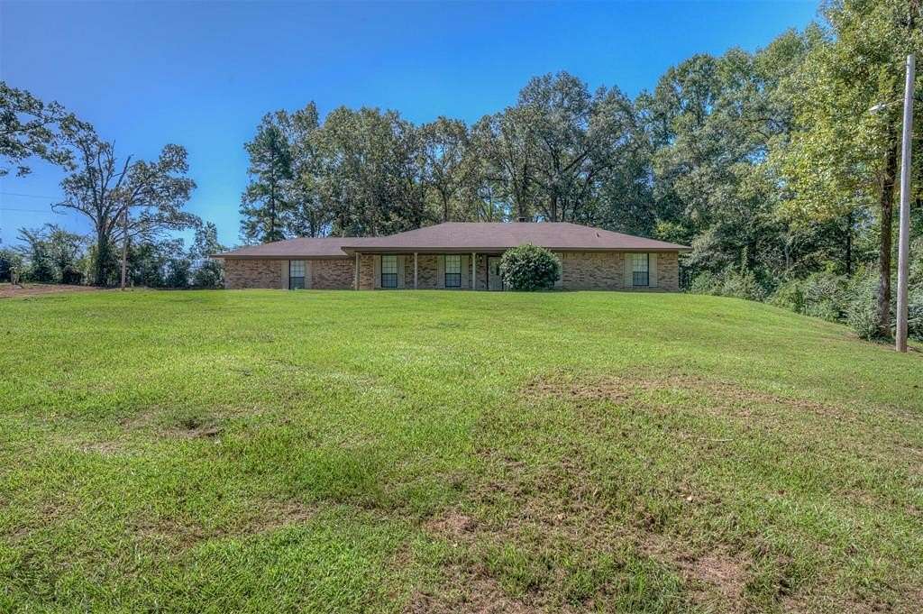 2.6 Acres of Residential Land with Home for Sale in Mansfield, Louisiana