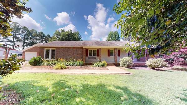 26 Acres of Land with Home for Sale in Newbern, Tennessee