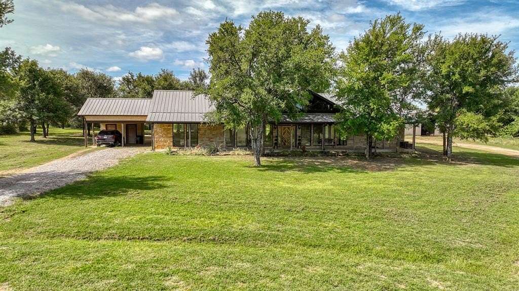 11.1 Acres of Land with Home for Sale in Millsap, Texas