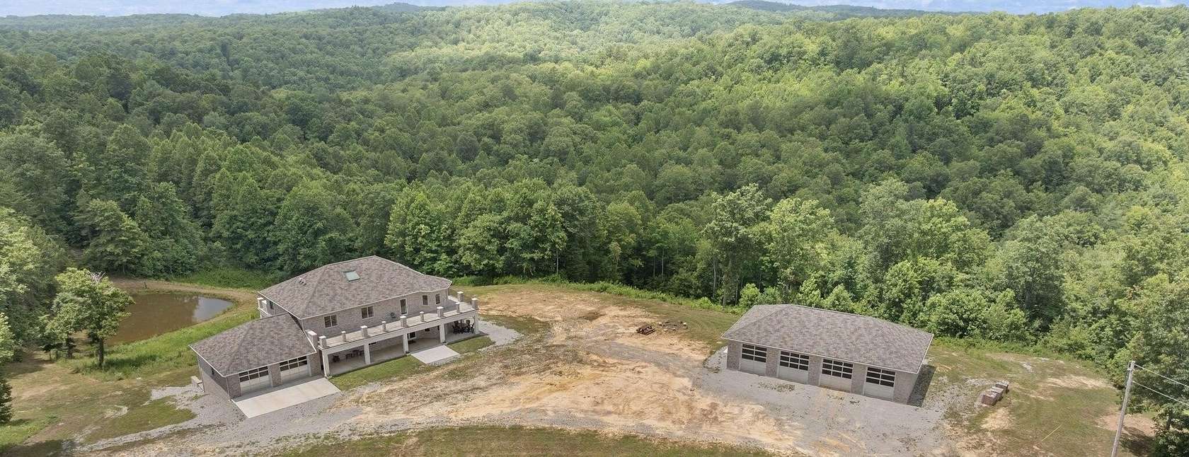 61 Acres of Land with Home for Sale in Strunk, Kentucky