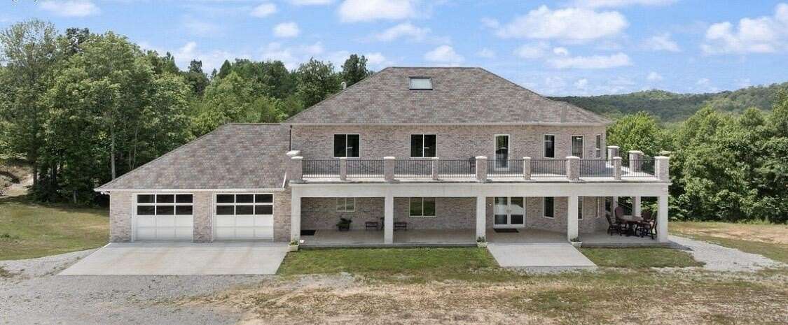 61 Acres of Land with Home for Sale in Strunk, Kentucky