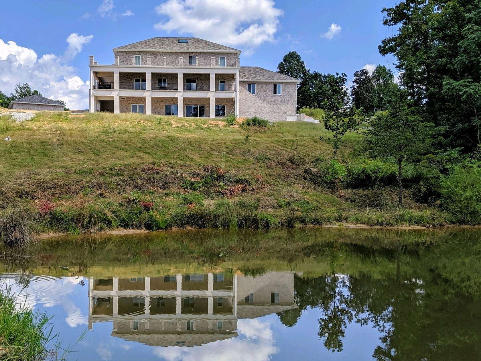 61 Acres of Land with Home for Sale in Strunk, Kentucky