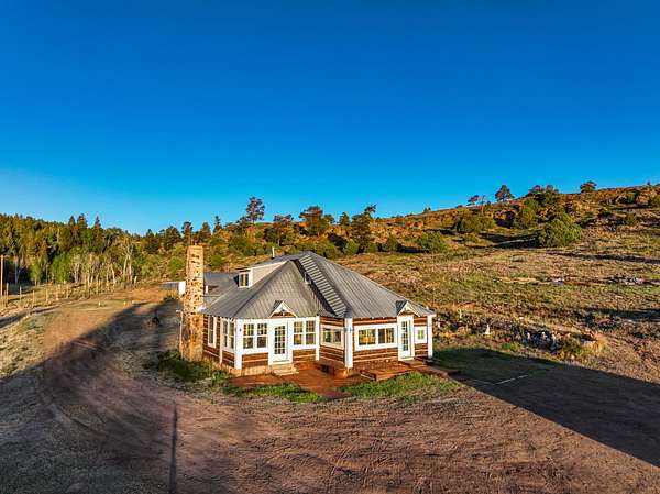 88 Acres of Recreational Land with Home for Sale in Powderhorn, Colorado