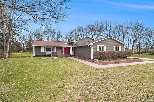 1.65 Acres of Residential Land with Home for Sale in Milford, Michigan