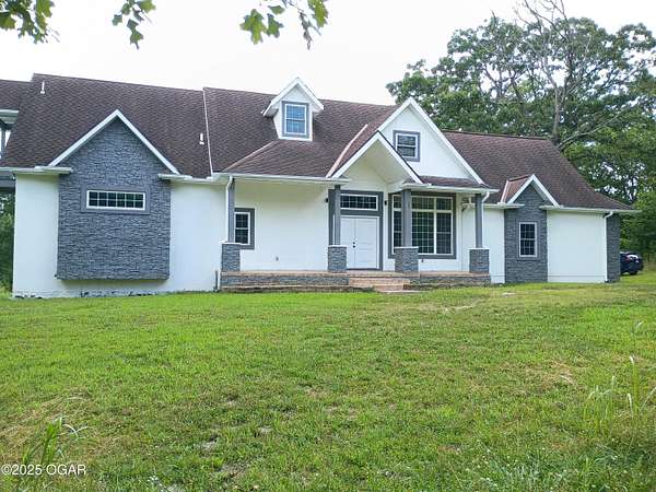 8 Acres of Residential Land with Home for Sale in Joplin, Missouri