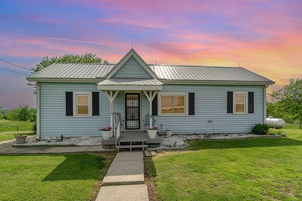 34.6 Acres of Land with Home for Sale in Butler, Kentucky