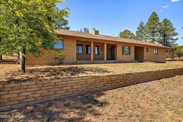 4 Acres of Residential Land with Home for Sale in Show Low, Arizona