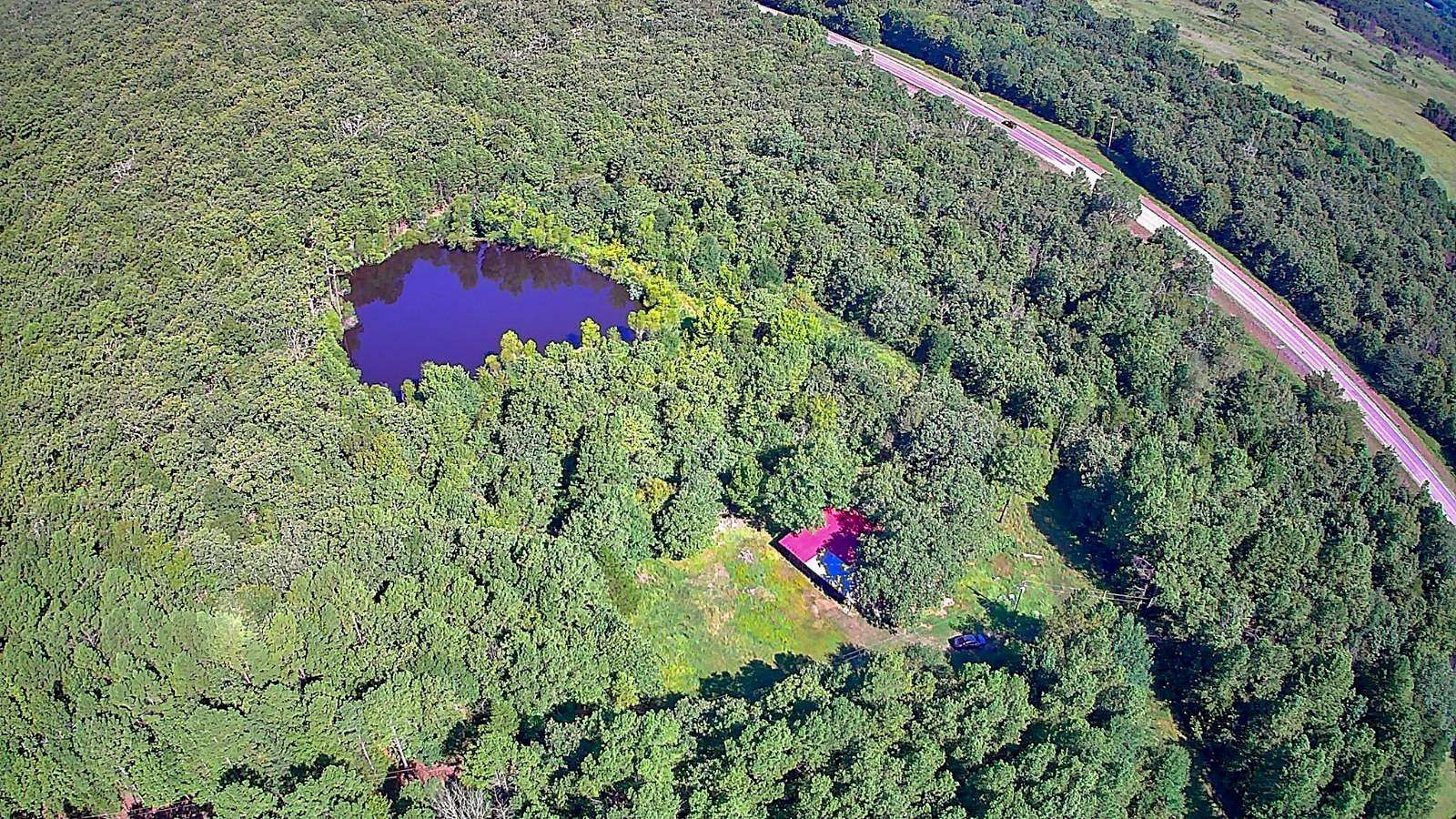 16.9 Acres of Recreational Land with Home for Sale in Wilburton, Oklahoma