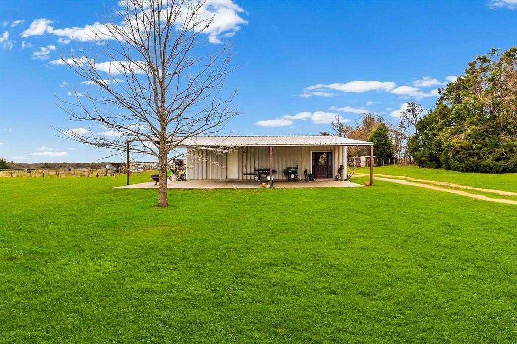 80 Acres of Agricultural Land with Home for Sale in Mexia, Texas