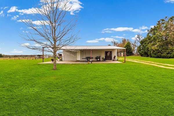 80 Acres of Agricultural Land with Home for Sale in Mexia, Texas